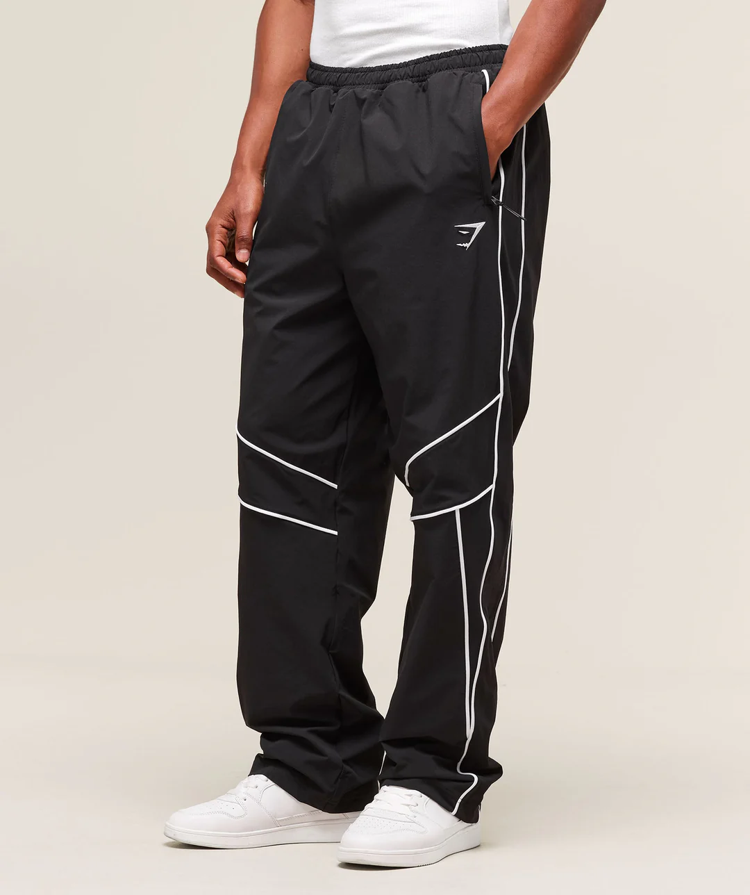 black crinkle track pants